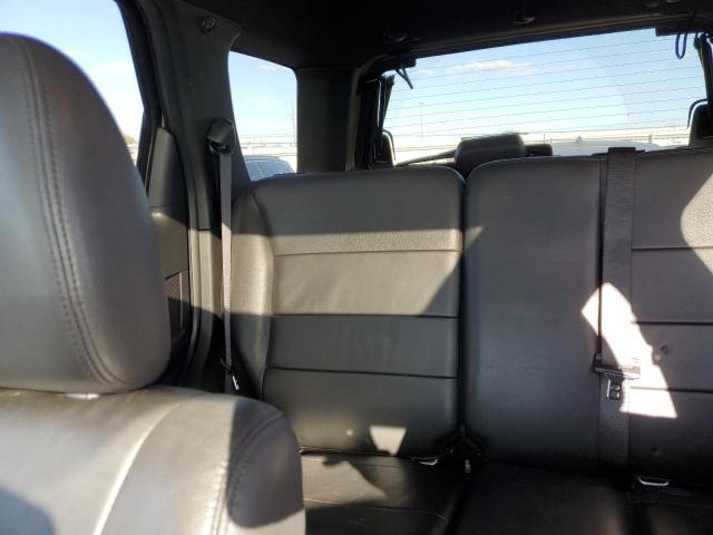 Photo 10 from auction – 2010 FORD ESCAPE LIM with VIN 1FMCU9EG7AKC81534