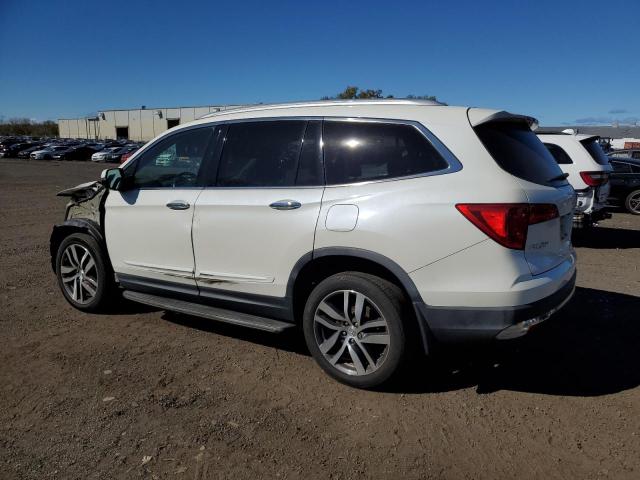 Photo 2 from auction – 2016 HONDA PILOT TOUR with VIN 5FNYF6H96GB070444