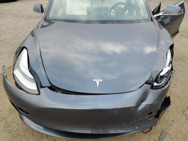 Photo 11 from auction – 2020 TESLA MODEL 3 with VIN 5YJ3E1EA1LF746002