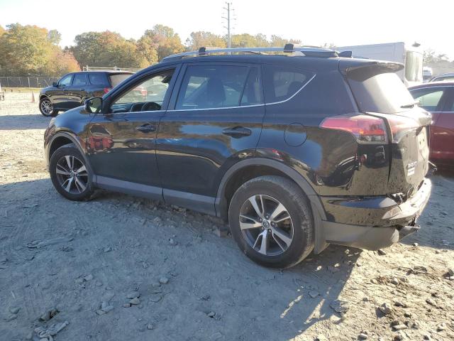 Photo 2 from auction – 2017 TOYOTA RAV4 XLE with VIN 2T3RFREV7HW594205