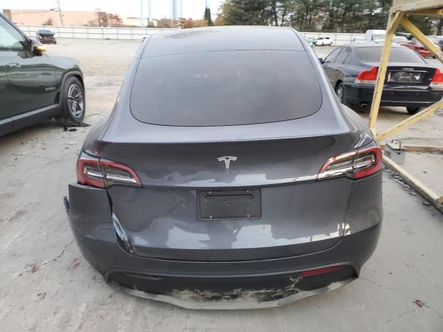 Photo 6 from auction – 2023 TESLA MODEL Y with VIN 7SAYGDED8PF945214