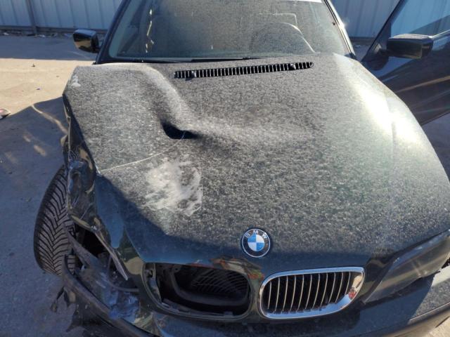 Photo 11 from auction – 2003 BMW 325 XI with VIN WBAEU33493PM53262