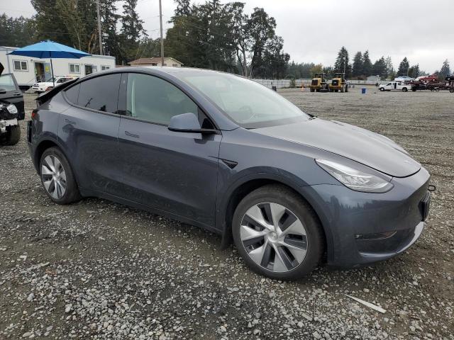 Снимка 4 от търг – 2022 TESLA MODEL Y с VIN 7SAYGAEE4NF569924