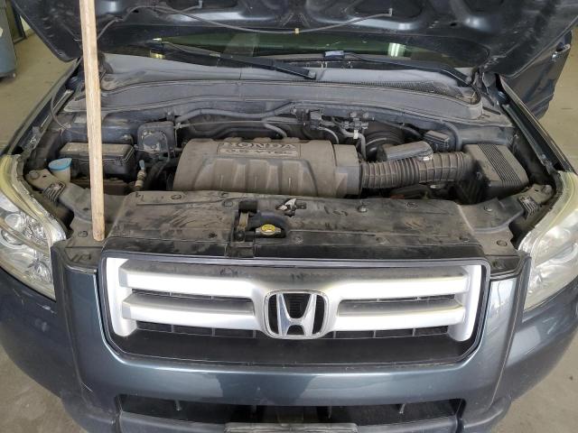 Photo 12 from auction – 2006 HONDA PILOT EX with VIN 2HKYF18686H501939