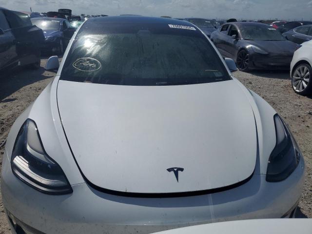 Photo 5 from auction – 2021 TESLA MODEL 3 with VIN 5YJ3E1EA6MF047210