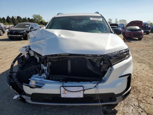 Photo 5 from auction – 2024 HONDA PILOT TRAI with VIN 5FNYG1H65RB008641