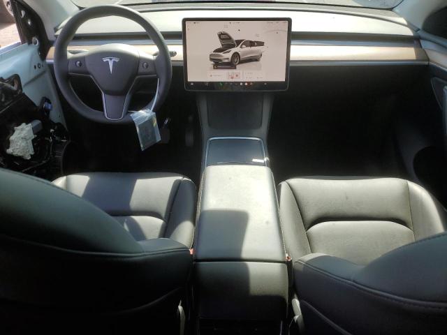 Photo 8 from auction – 2022 TESLA MODEL Y with VIN 7SAYGDEE2NF515569