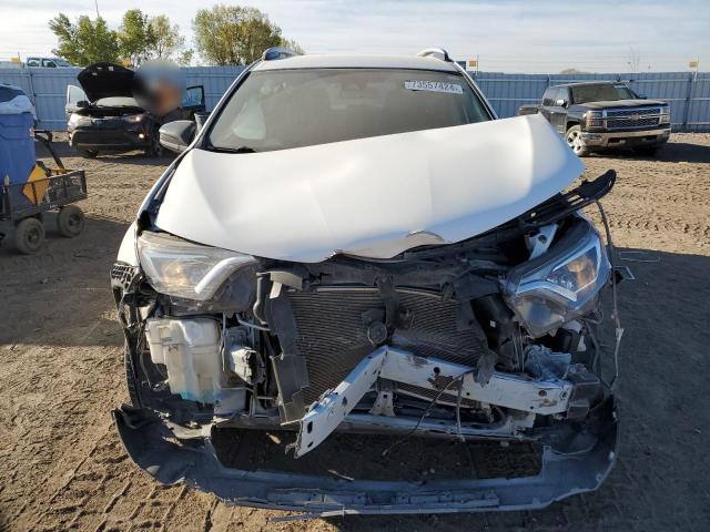Photo 5 from auction – 2018 TOYOTA RAV4 LE with VIN 2T3BFREV8JW855557