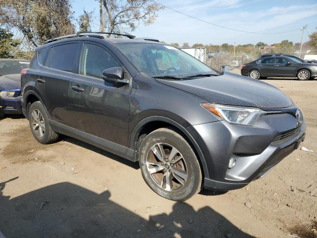 Photo 4 from auction – 2016 TOYOTA RAV4 XLE with VIN JTMRFREV4GJ077618