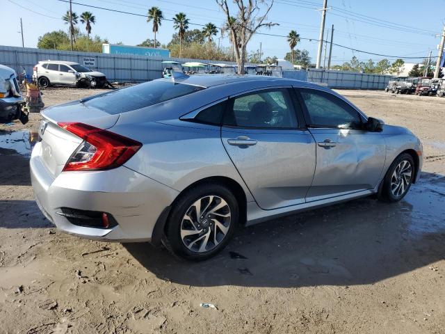 Photo 3 from auction – 2018 HONDA CIVIC EX with VIN 19XFC2F77JE000345
