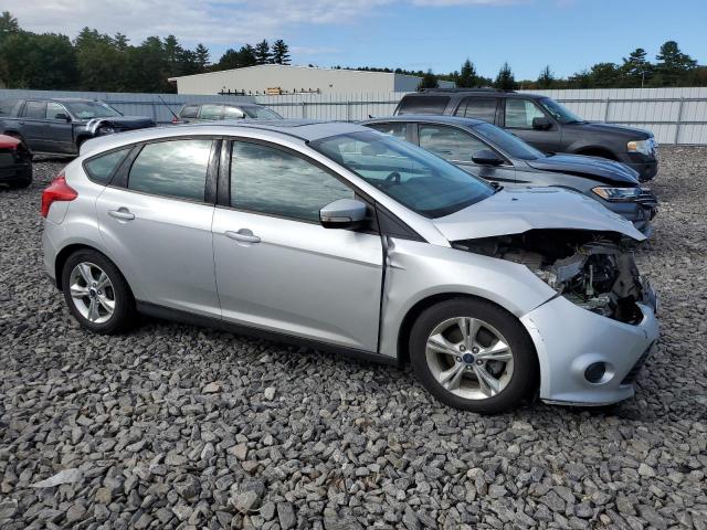 Foto 4 de la subasta – 2014 FORD FOCUS SE con VIN 1FADP3K28EL101618