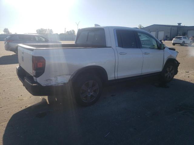 Photo 3 from auction – 2020 HONDA RIDGELINE with VIN 5FPYK3F77LB002473