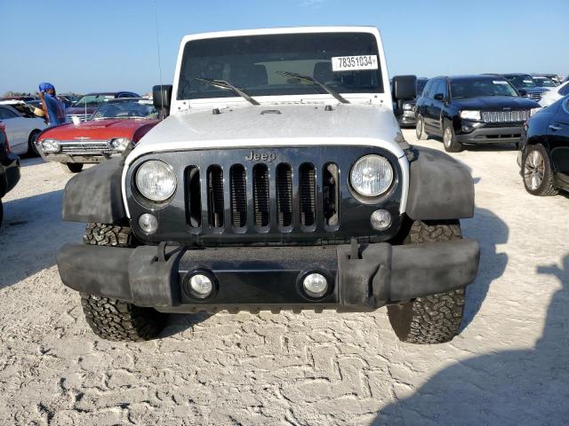 Photo 5 from auction – 2016 JEEP WRANGLER U with VIN 1C4BJWDG2GL152113