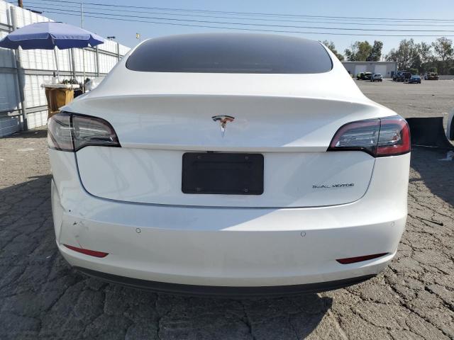 Photo 6 from auction – 2021 TESLA MODEL 3 with VIN 5YJ3E1EBXMF997482