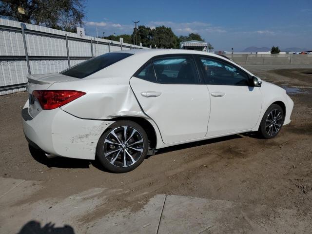 Photo 3 from auction – 2018 TOYOTA COROLLA L with VIN 5YFBURHE6JP819412