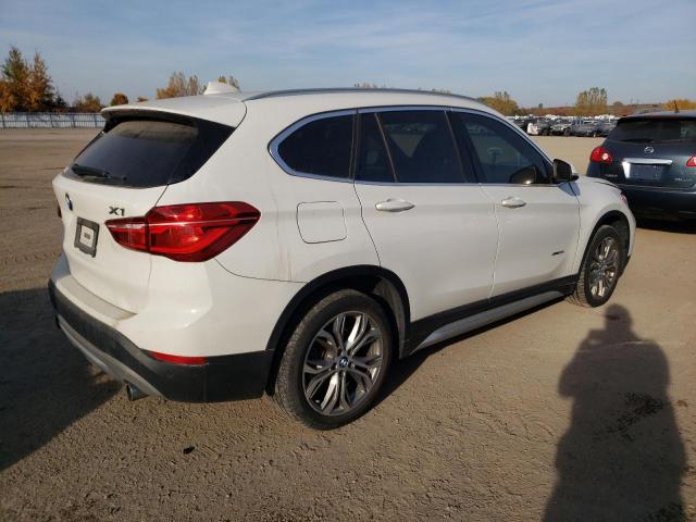 Photo 3 from auction – 2017 BMW X1 XDRIVE2 with VIN WBXHT3C3XH5F75440