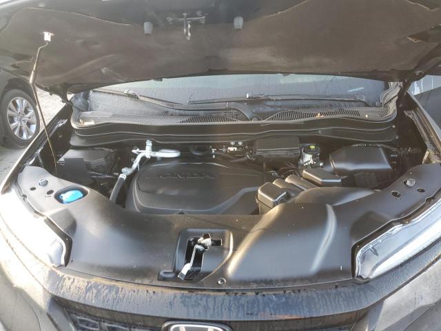 Photo 12 from auction – 2021 HONDA PASSPORT E with VIN 5FNYF7H57MB003902