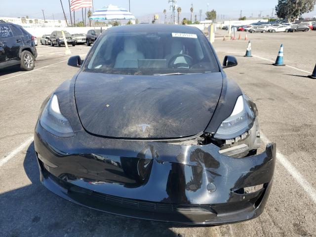 Photo 5 from auction – 2022 TESLA MODEL 3 with VIN 5YJ3E1EB9NF133315