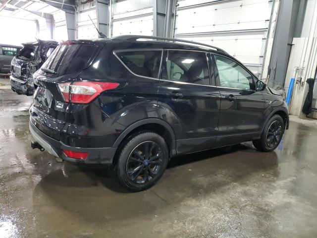 Photo 3 from auction – 2018 FORD ESCAPE SE with VIN 1FMCU9GD8JUC08275