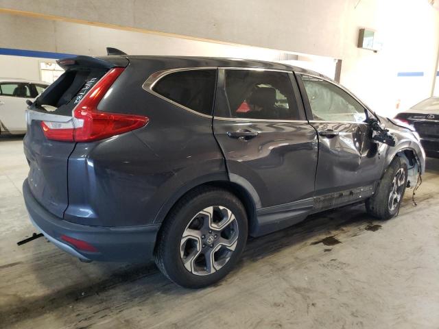 Photo 3 from auction – 2017 HONDA CR-V EX with VIN 7FARW1H54HE048601