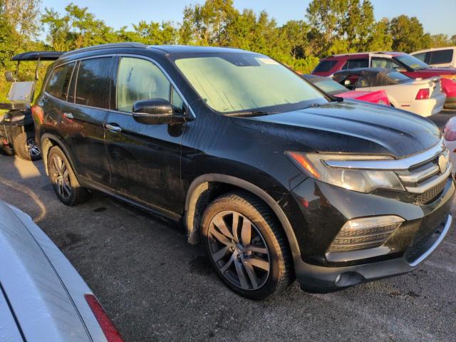 Photo 4 from auction – 2017 HONDA PILOT ELIT with VIN 5FNYF6H07HB067734