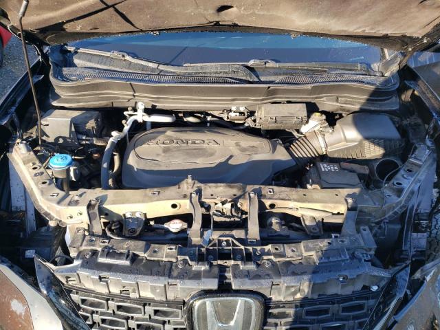 Photo 12 from auction – 2021 HONDA PASSPORT E with VIN 5FNYF8H09MB008173