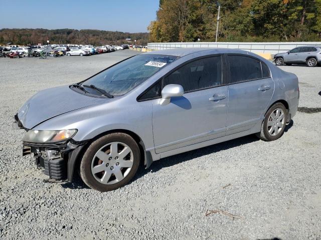 HONDA CIVIC LX 2011 with VIN 19XFA1F5XBE026308 - Photo from auction