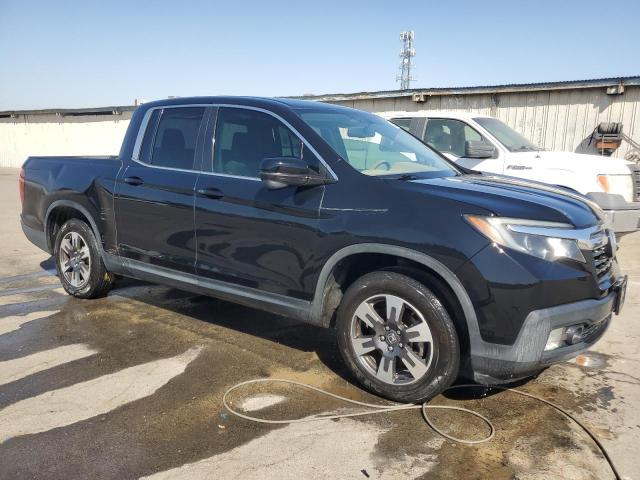 Photo 4 from auction – 2017 HONDA RIDGELINE with VIN 5FPYK2F60HB010813