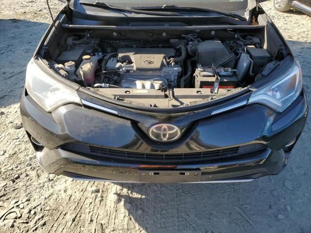 Photo 12 from auction – 2017 TOYOTA RAV4 XLE with VIN 2T3RFREV7HW594205
