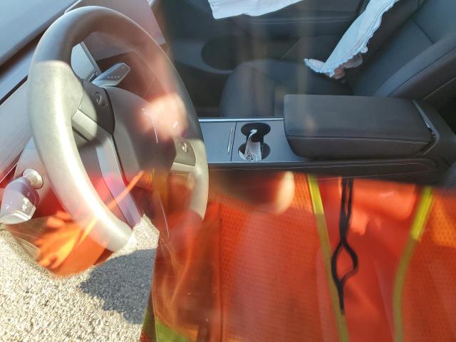 Photo 7 from auction – 2023 TESLA MODEL Y with VIN 7SAYGDEE2PA083551