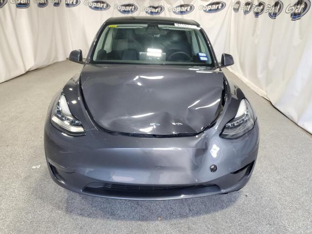 Photo 5 from auction – 2022 TESLA MODEL Y with VIN 7SAYGDEE1NF386207