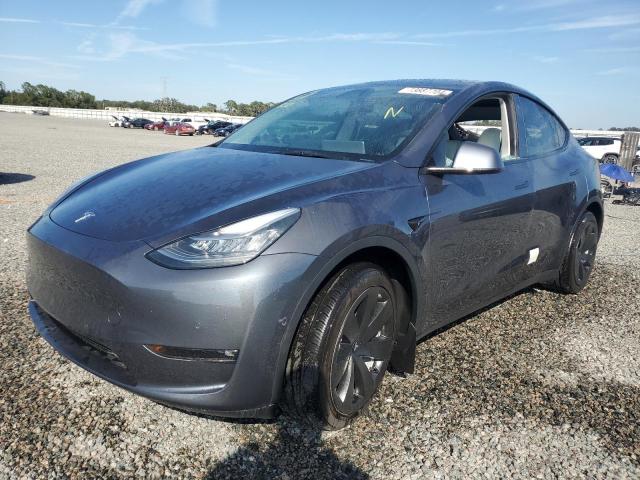 TESLA MODEL Y 2022 with VIN 7SAYGDEE4NF311825 - Photo from auction