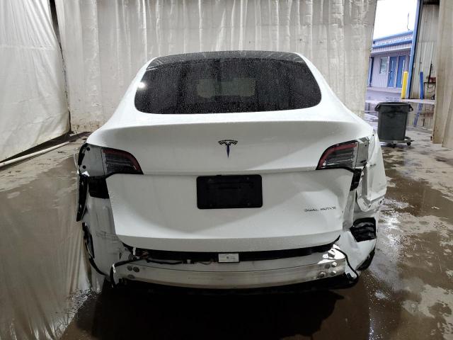 Photo 6 from auction – 2023 TESLA MODEL Y with VIN 7SAYGDEE0PF615382