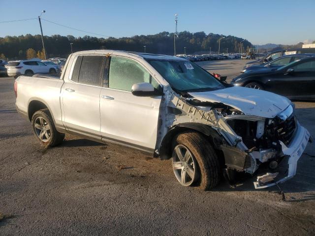 Photo 4 from auction – 2022 HONDA RIDGELINE with VIN 5FPYK3F74NB028905