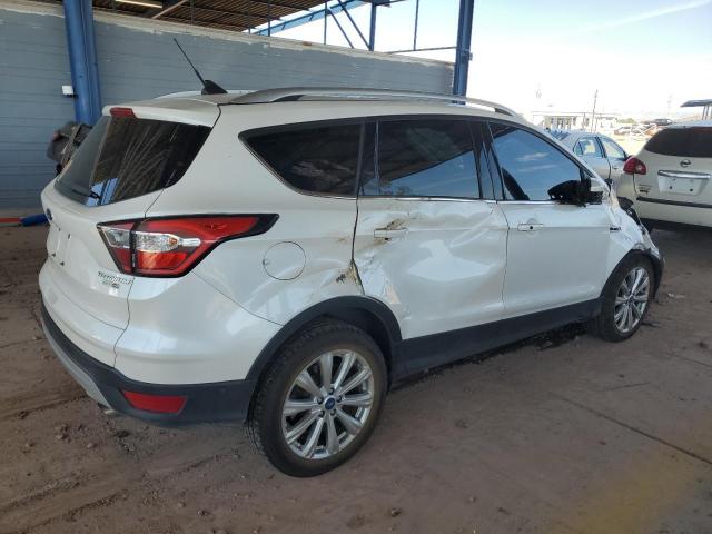Photo 3 from auction – 2018 FORD ESCAPE TIT with VIN 1FMCU9J98JUC07888