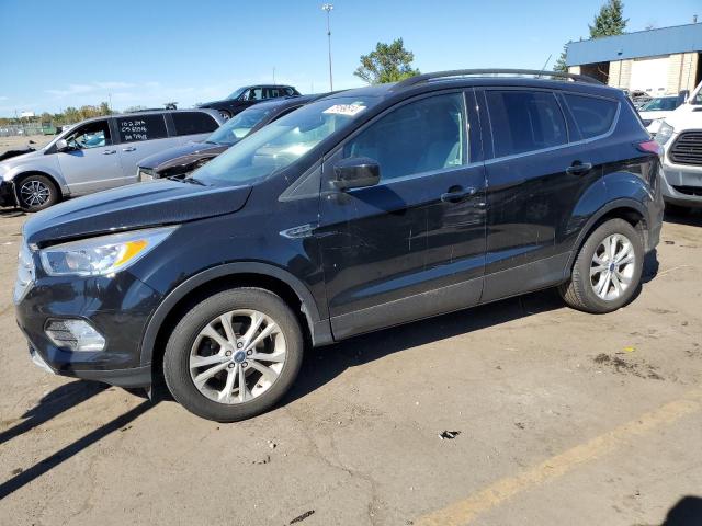 FORD ESCAPE SE 2018 with VIN 1FMCU0GD3JUB70689 - Photo from auction