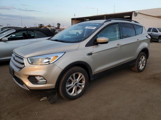 FORD ESCAPE SE 2018 with VIN 1FMCU9GD3JUC63197 - Photo from auction
