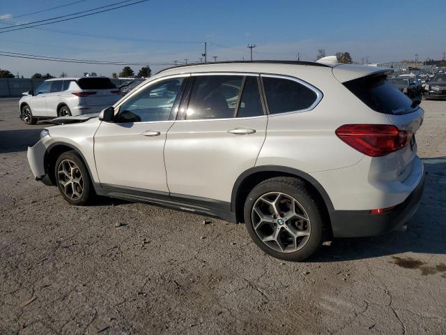 Photo 2 from auction – 2018 BMW X1 XDRIVE2 with VIN WBXHT3C35J5L27082