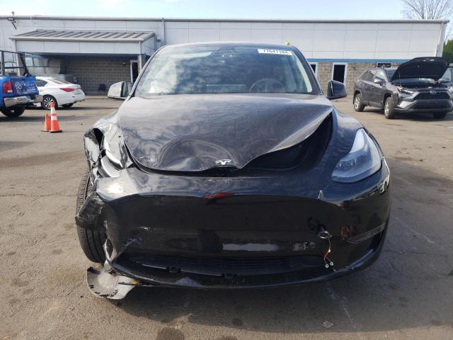 Photo 5 from auction – 2023 TESLA MODEL Y with VIN 7SAYGAEE2PF919117