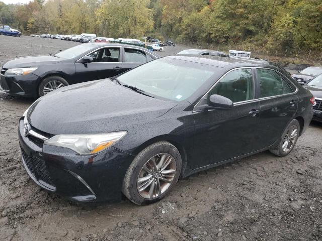 TOYOTA CAMRY LE 2017 with VIN 4T1BF1FKXHU312929 - Photo from auction
