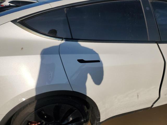 Photo 11 from auction – 2023 TESLA MODEL Y with VIN 7SAYGDEF8PF707977