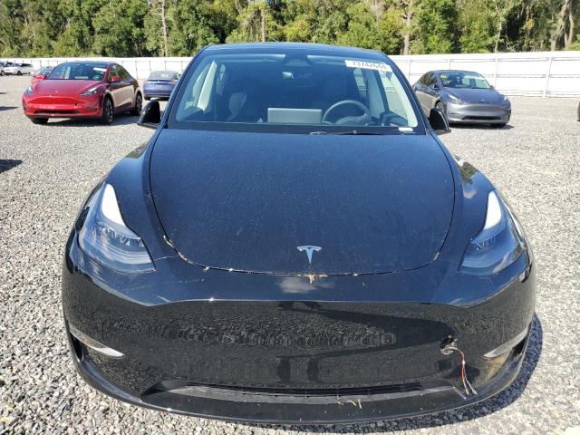Photo 5 from auction – 2023 TESLA MODEL Y with VIN 7SAYGDEE0PA181512