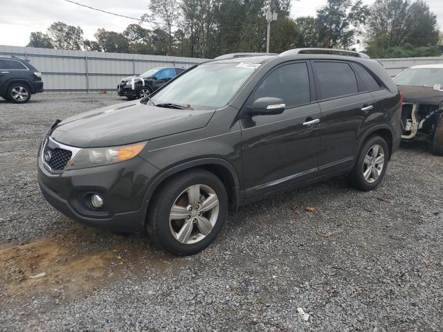 KIA SORENTO EX 2012 with VIN 5XYKU4A28CG206993 - Photo from auction