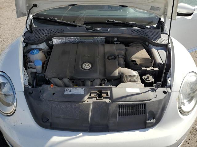 Photo 11 from auction – 2013 VOLKSWAGEN BEETLE with VIN 3VW5P7AT6DM829318