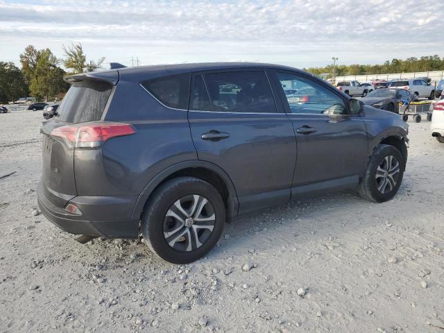 Photo 3 from auction – 2018 TOYOTA RAV4 LE with VIN 2T3ZFREV8JW436610