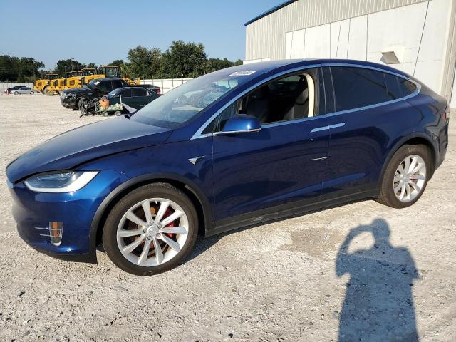 TESLA MODEL X 2017 with VIN 5YJXCBE44HF047316 - Photo from auction