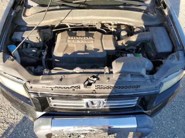 Photo 11 from auction – 2007 HONDA RIDGELINE with VIN 2HJYK16517H539802