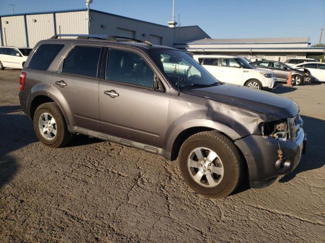 Photo 4 from auction – 2011 FORD ESCAPE LIM with VIN 1FMCU0EG6BKC69064