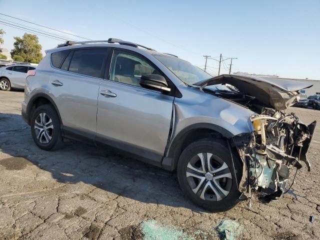Photo 4 from auction – 2018 TOYOTA RAV4 LE with VIN JTMZFREV2JJ208925