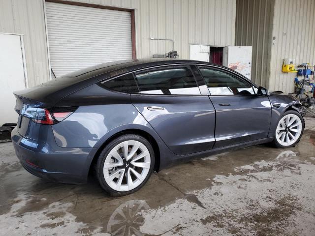 Снимка 3 от търг – 2022 TESLA MODEL 3 с VIN 5YJ3E1EA6NF357939